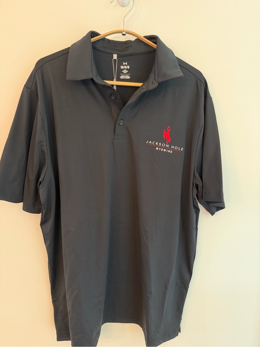 Under Armour Black Polo with Red Jackson Hole Logo
